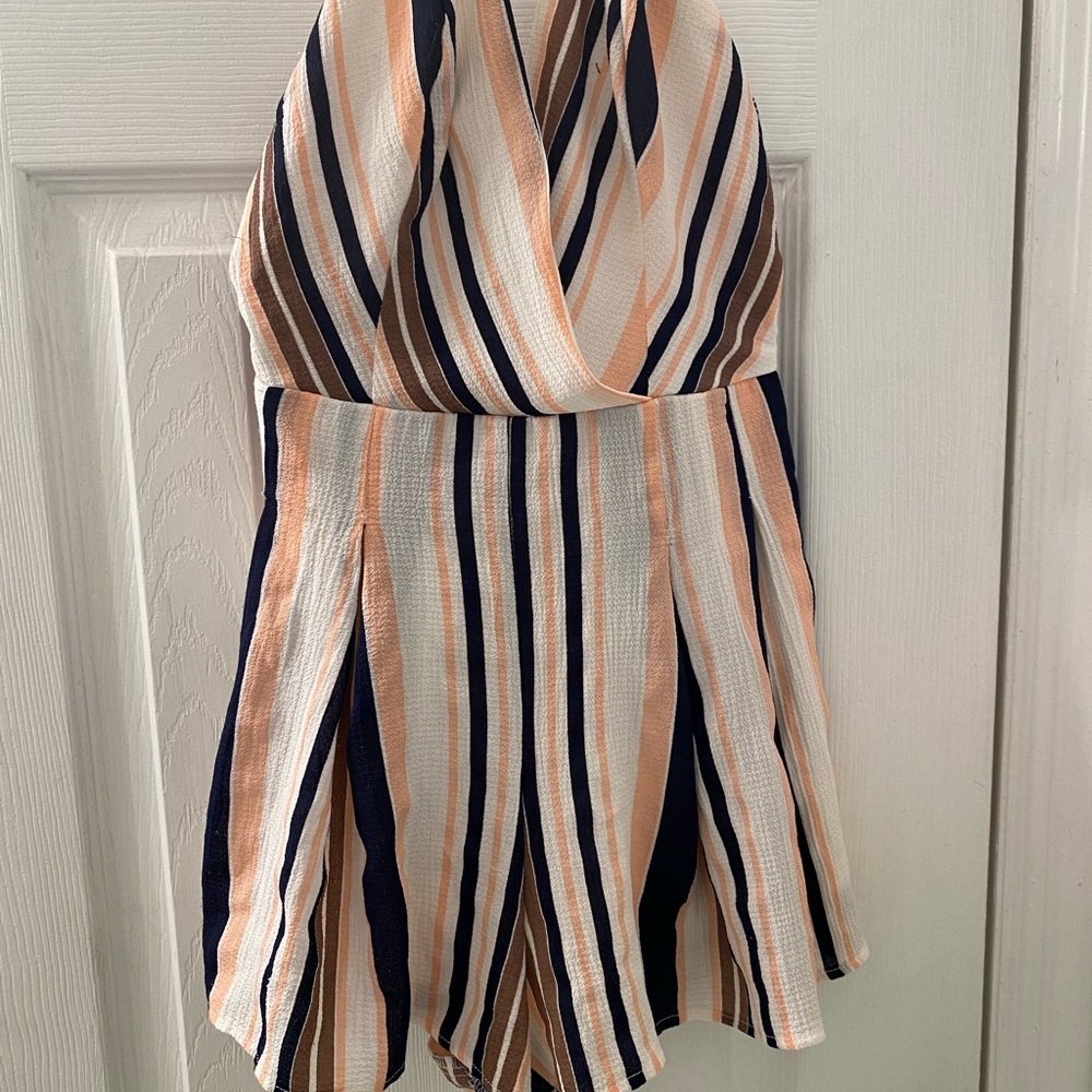 Light pink, white, and navy blue striped romper